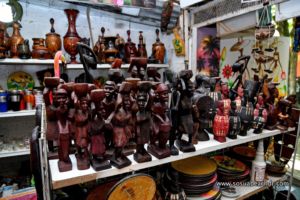 Wood carved statues and plates