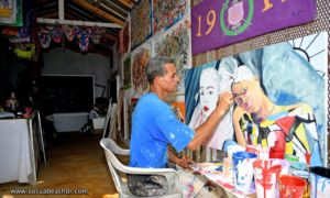 Teddy painting in his Shop