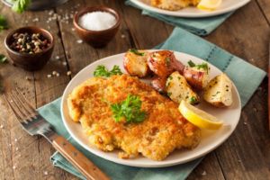 Homemade Breaded German Weiner Schnitzel with Potatoes Homemade Breaded German Weiner Schnitzel
